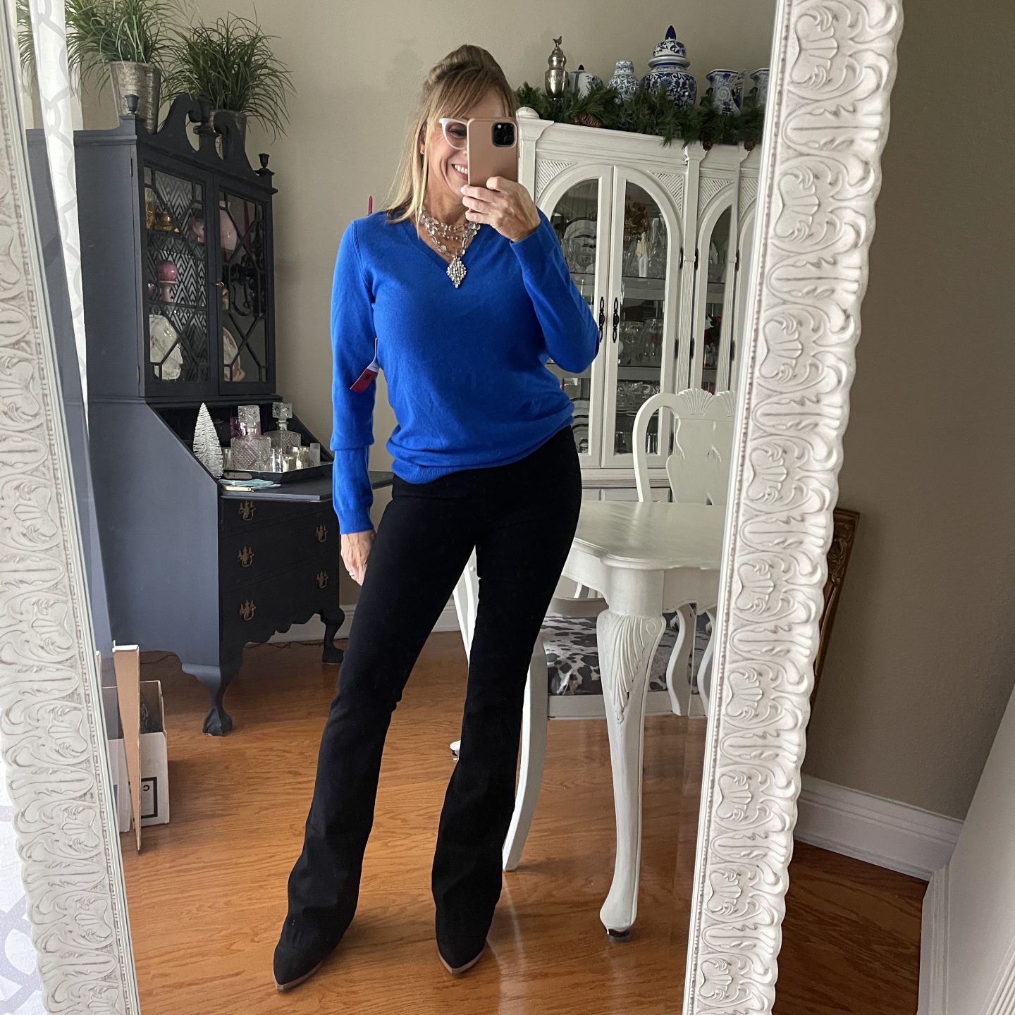 Blue cashmere sweater + Black Flare pants + Booties + Statement necklace