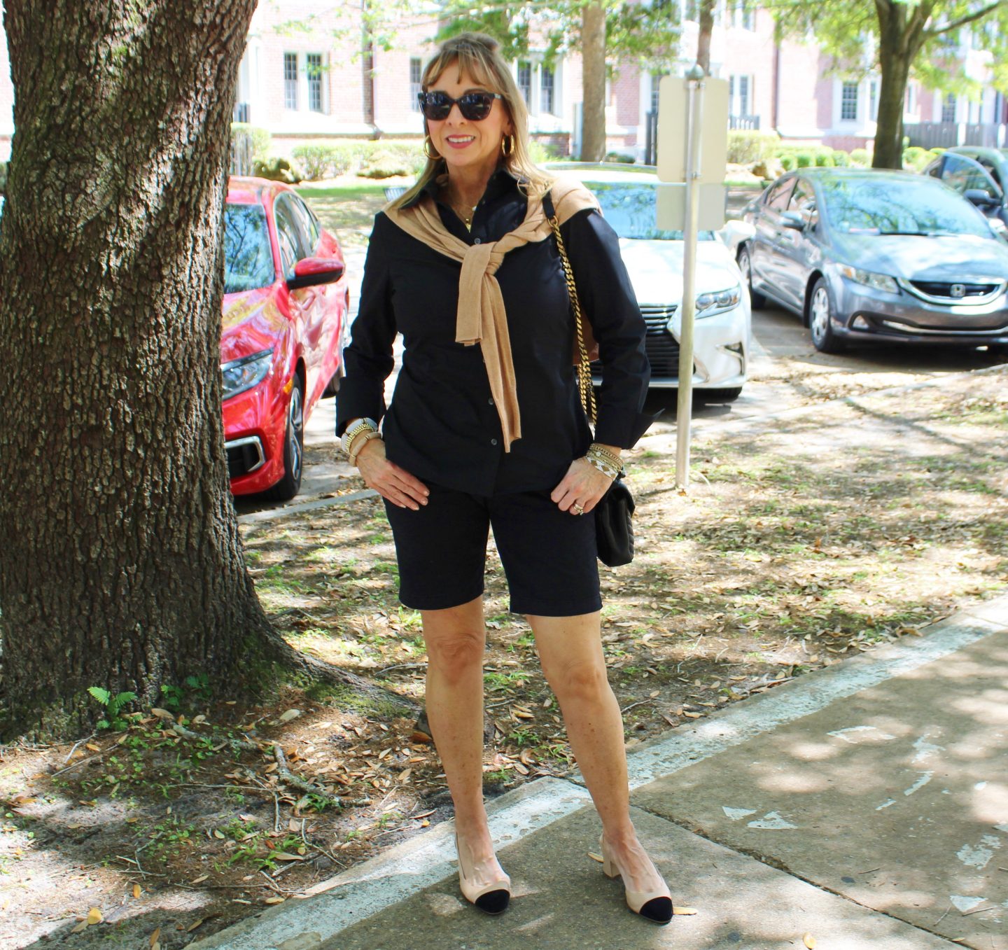 Black Shirt + Black Shorts + Camel Sweater + Cap Toe Pumps
#springoutfit